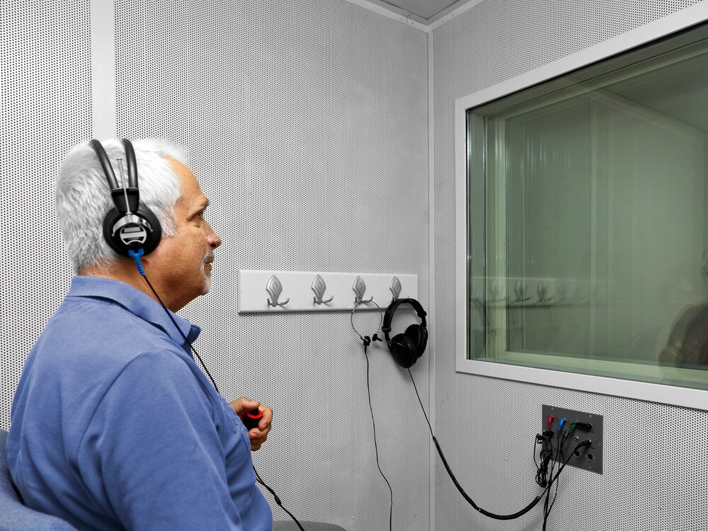 Audiologist conducting a comprehensive hearing evaluation at Autumn Oak in Friendswood, TX