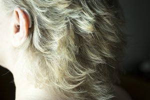 Close-up of woman wearing a hearing aid